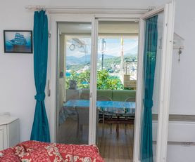 Livingroom with single beds of apartment for rent Utjeha Montenegro